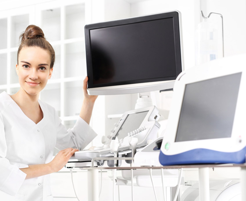Female-physician-setting-up-equipment-for-varicose-veins-removal-in-Las-Vegas